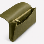 Salome foldover clutch in olive open showing gold-zip pocket and card slots interior