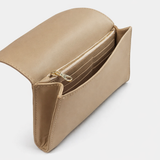 Salome foldover clutch in sand open showing gold-zip pocket and card slots interior