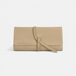 Parker Clay Salome full-grain leather foldover clutch in sand, exterior view showing wraparound tie strap